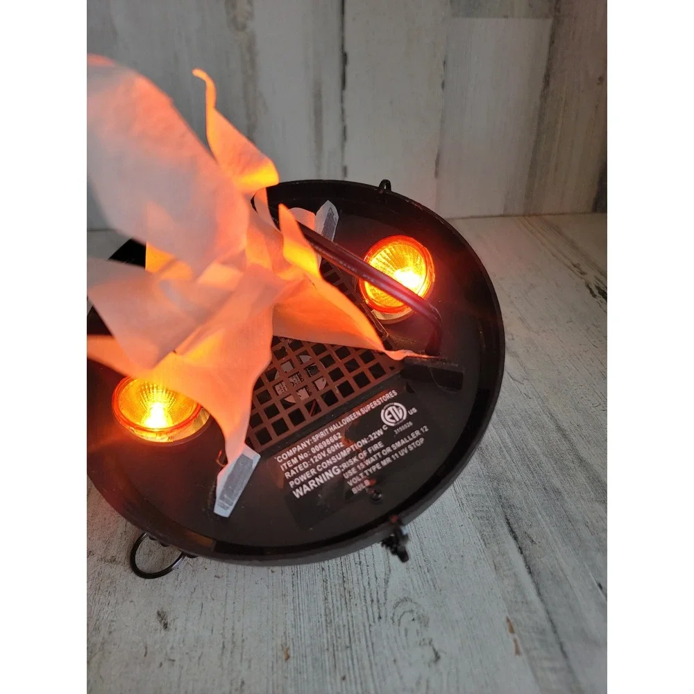 Spirit Halloween hanging‎ light up cauldron flame animated prop